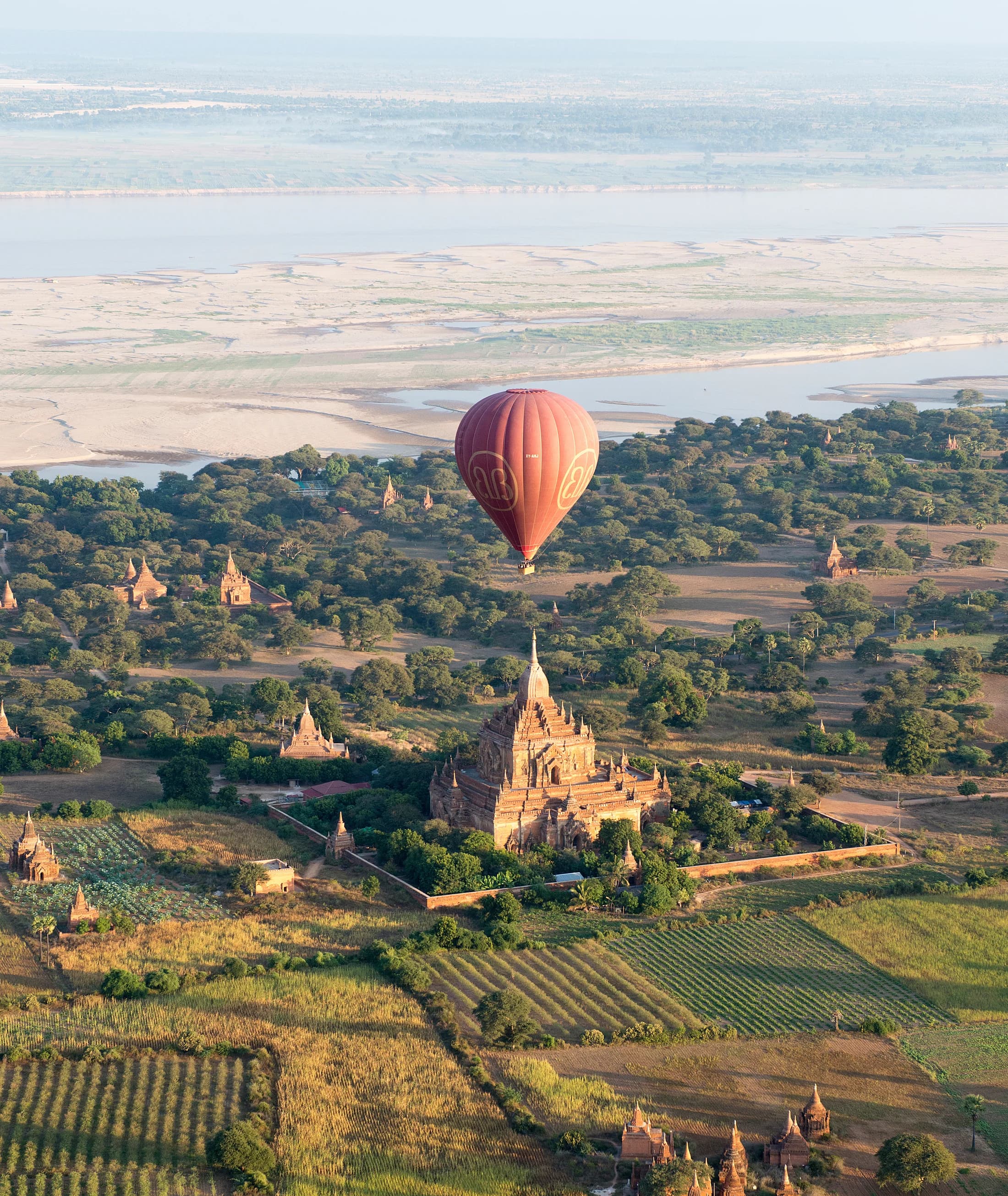 A hot air balloon above Bagan's temples and the Ayeyarwady River